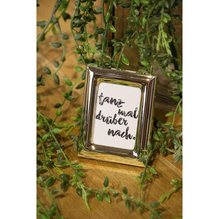 EDZARD Display mit 24 Rahmen